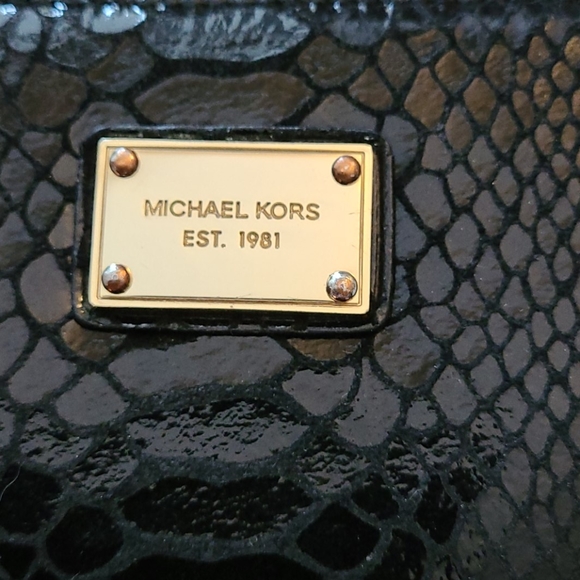 Michael Kors Handbags - EUC Michael Kors small wristlet wallet